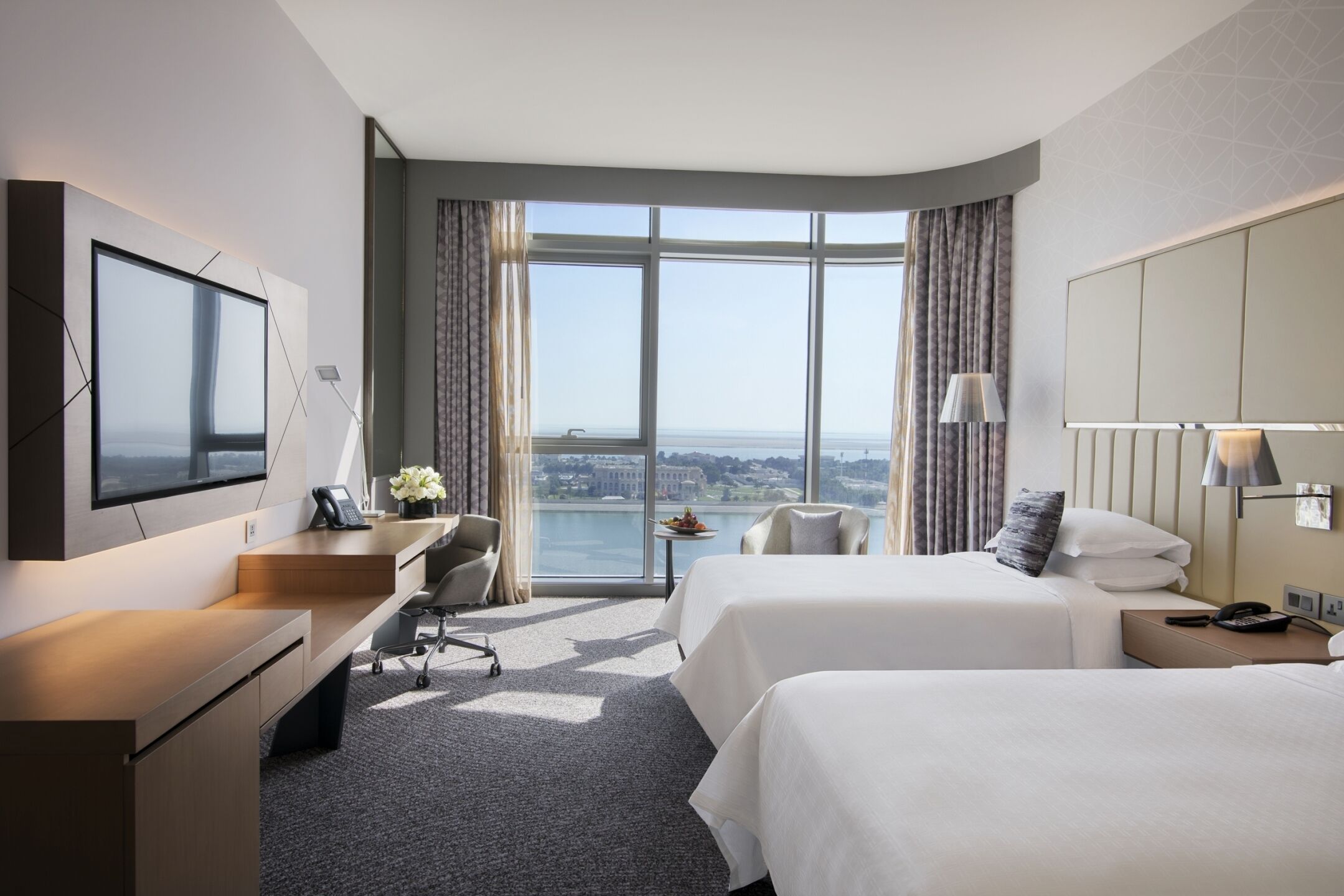 Hypo-allergenic bedding, down comforters, minibar, in-room safe