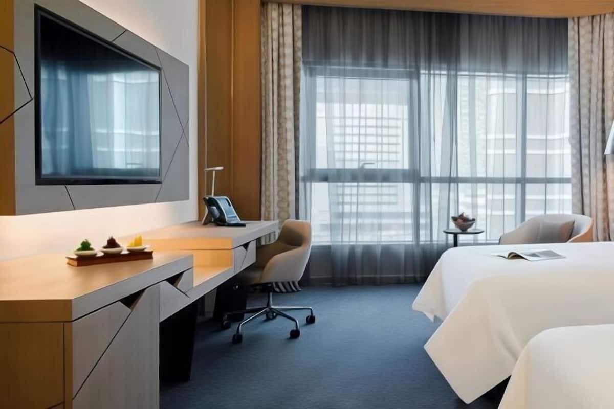 Hypo-allergenic bedding, down duvets, minibar, in-room safe