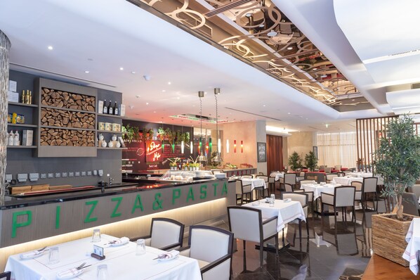 2 restaurants, breakfast, lunch, dinner served; Halal dishes