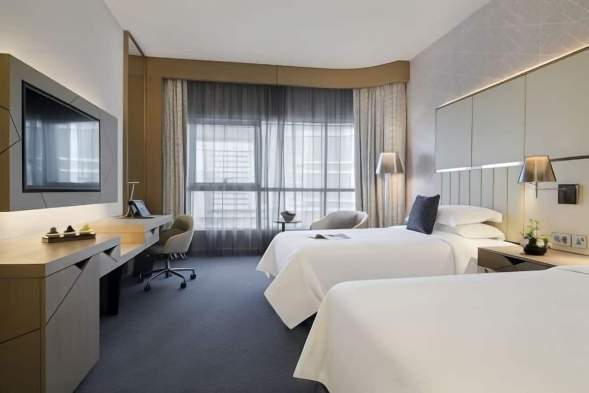Hypo-allergenic bedding, down duvets, minibar, in-room safe