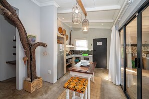 Superior Villa | Private kitchen | Full-size fridge, microwave, stovetop, electric kettle
