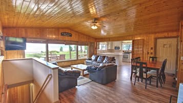 Älytelevisio, DVD-soitin, pöytäjalkapallopöytä, videokirjasto