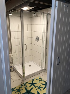 Combined shower/tub, hair dryer, towels, toilet paper