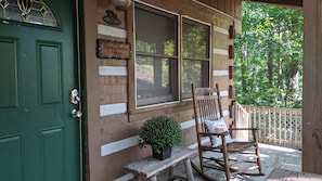 Step into the charming Honeysuckle Cabin, offering a peaceful retreat amidst lush surroundings.