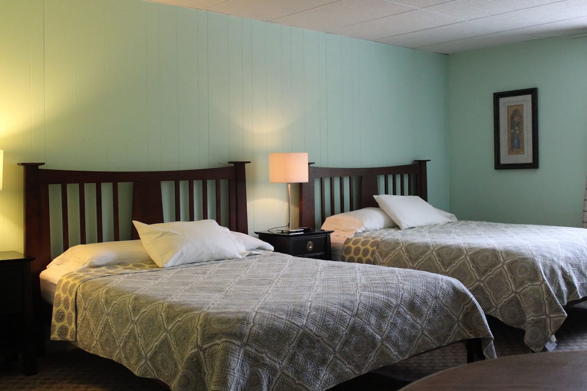 Quadruple Room | Premium bedding, down comforters, iron/ironing board, free WiFi