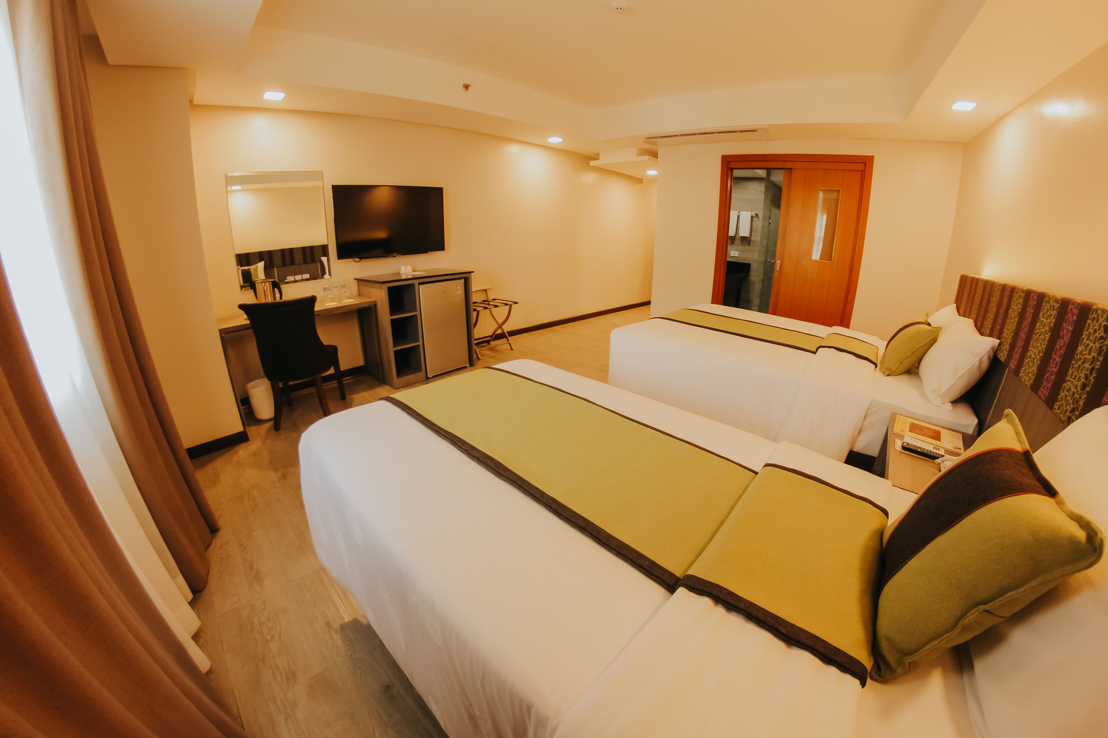 premier twin room (east wing) | minibar, in-room safe, individually furnished, desk