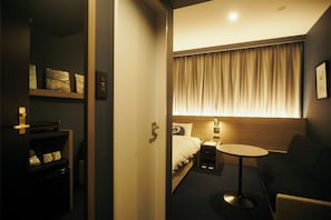 Down duvets, desk, laptop workspace, blackout curtains