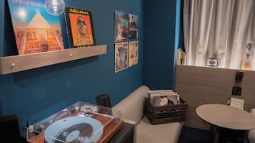 VINYL SUITE ROOM | Down comforters, desk, laptop workspace, blackout drapes