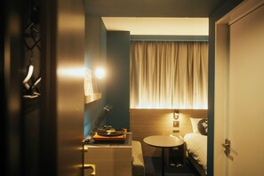 Cobrellits, escriptori i espai de treball apte per a portàtils