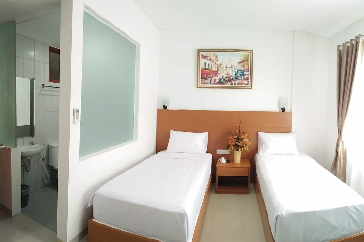 Habitación estándar con 2 camas individuales | Escritorio, wifi gratis y ropa de cama