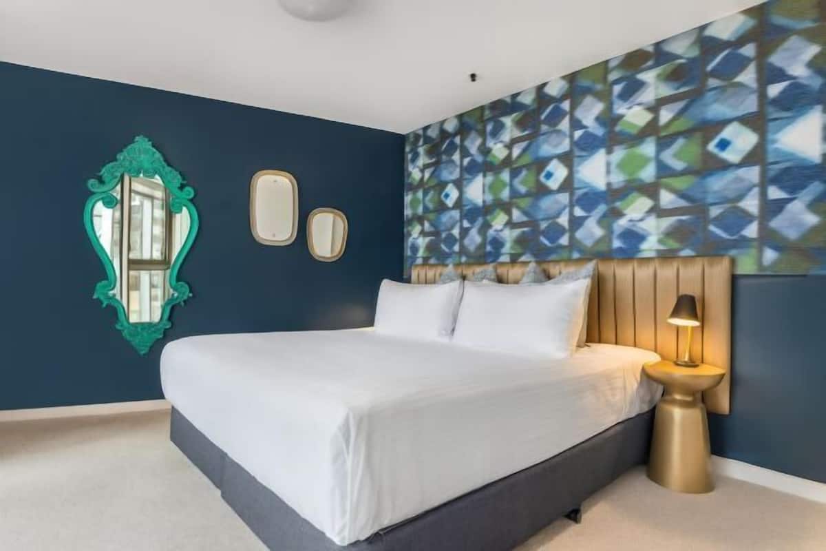 Premium bedding, in-room safe, blackout curtains, soundproofing