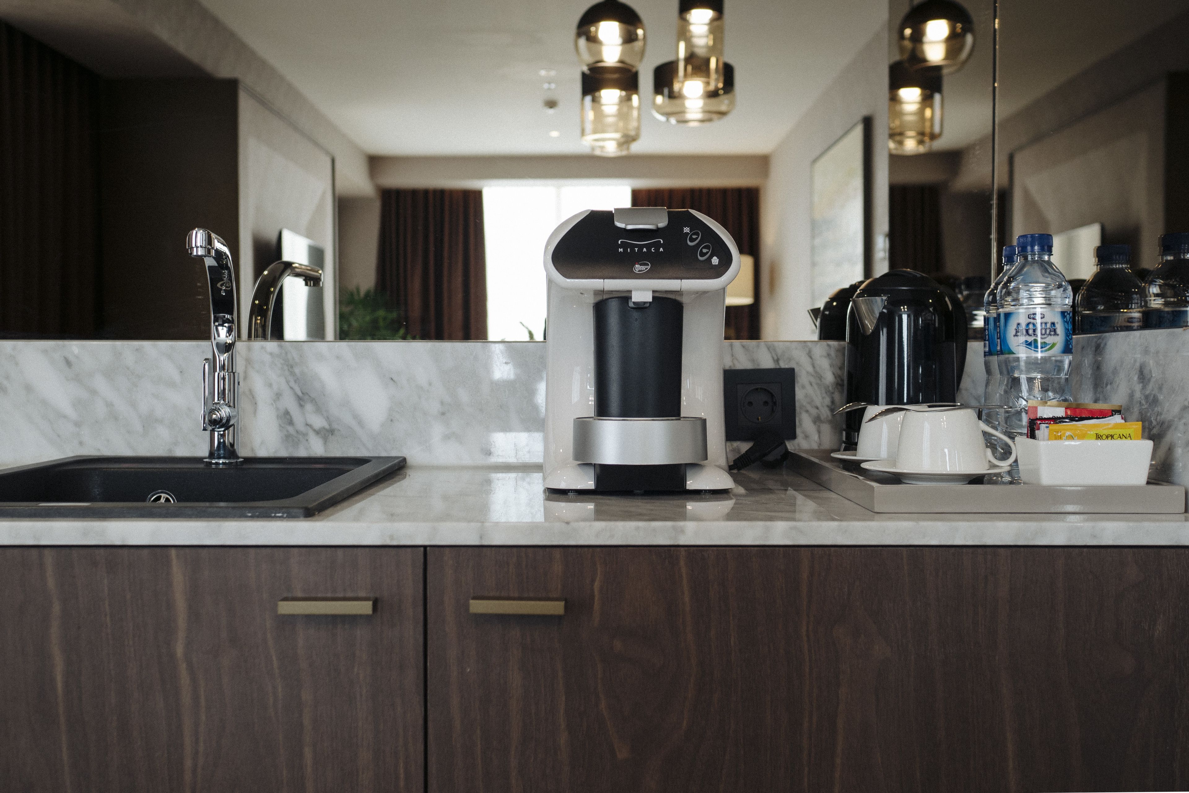 suite | coffee and/or coffee maker