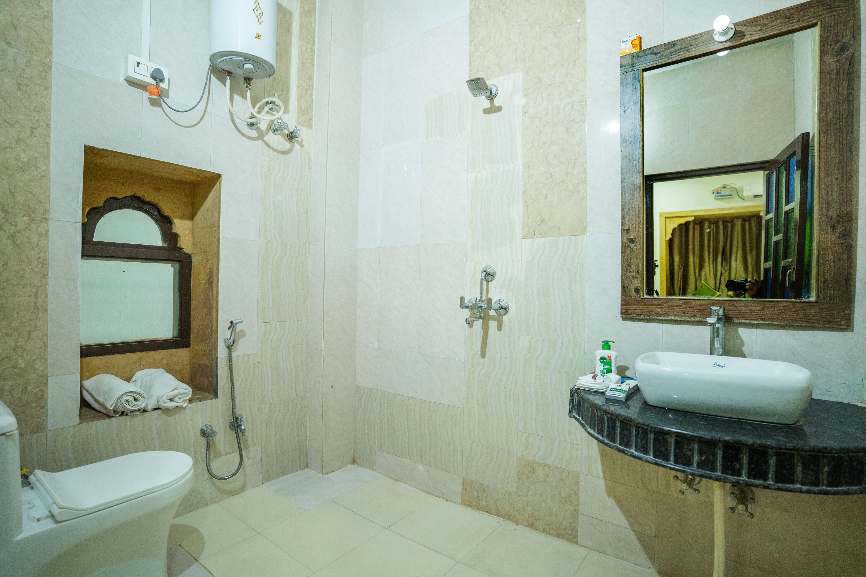 super deluxe room | bathroom | shower, free toiletries, hair dryer, slippers