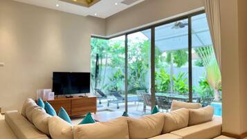 Villa, 3 Bedrooms, Pool View | Living room | LED TV, fireplace, DVD player