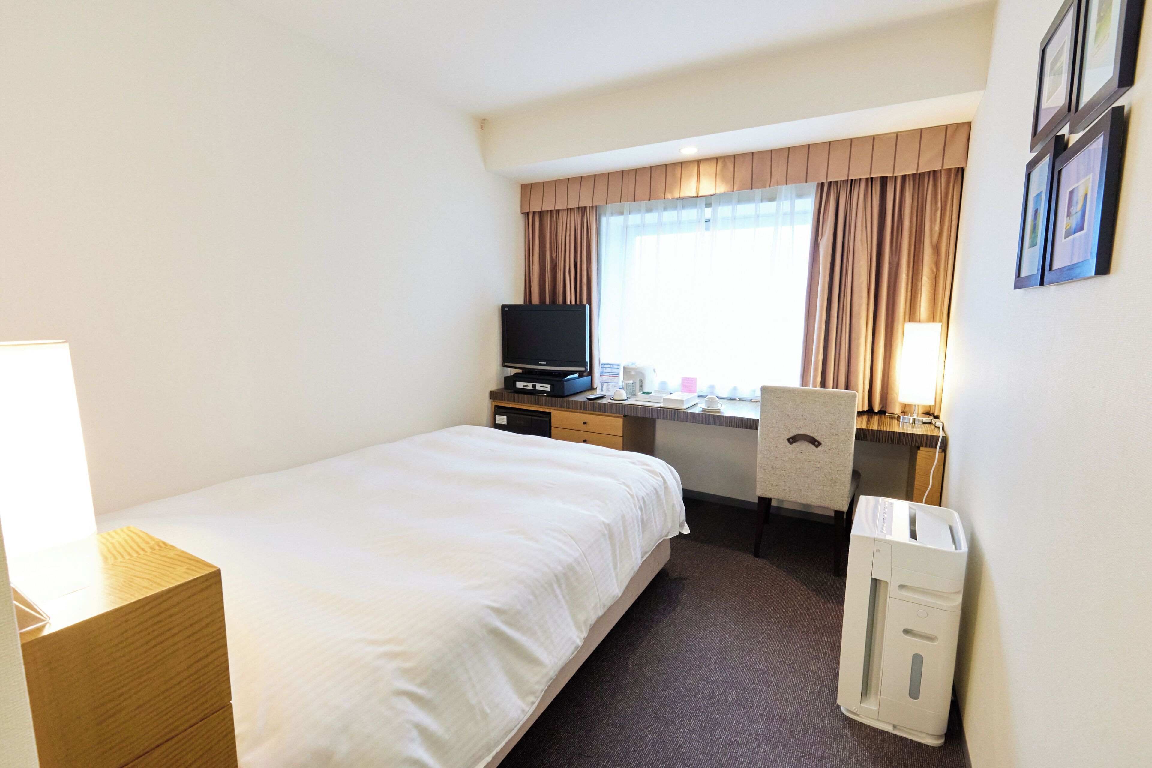 In-room safe, desk, blackout curtains, iron/ironing board (on request)
