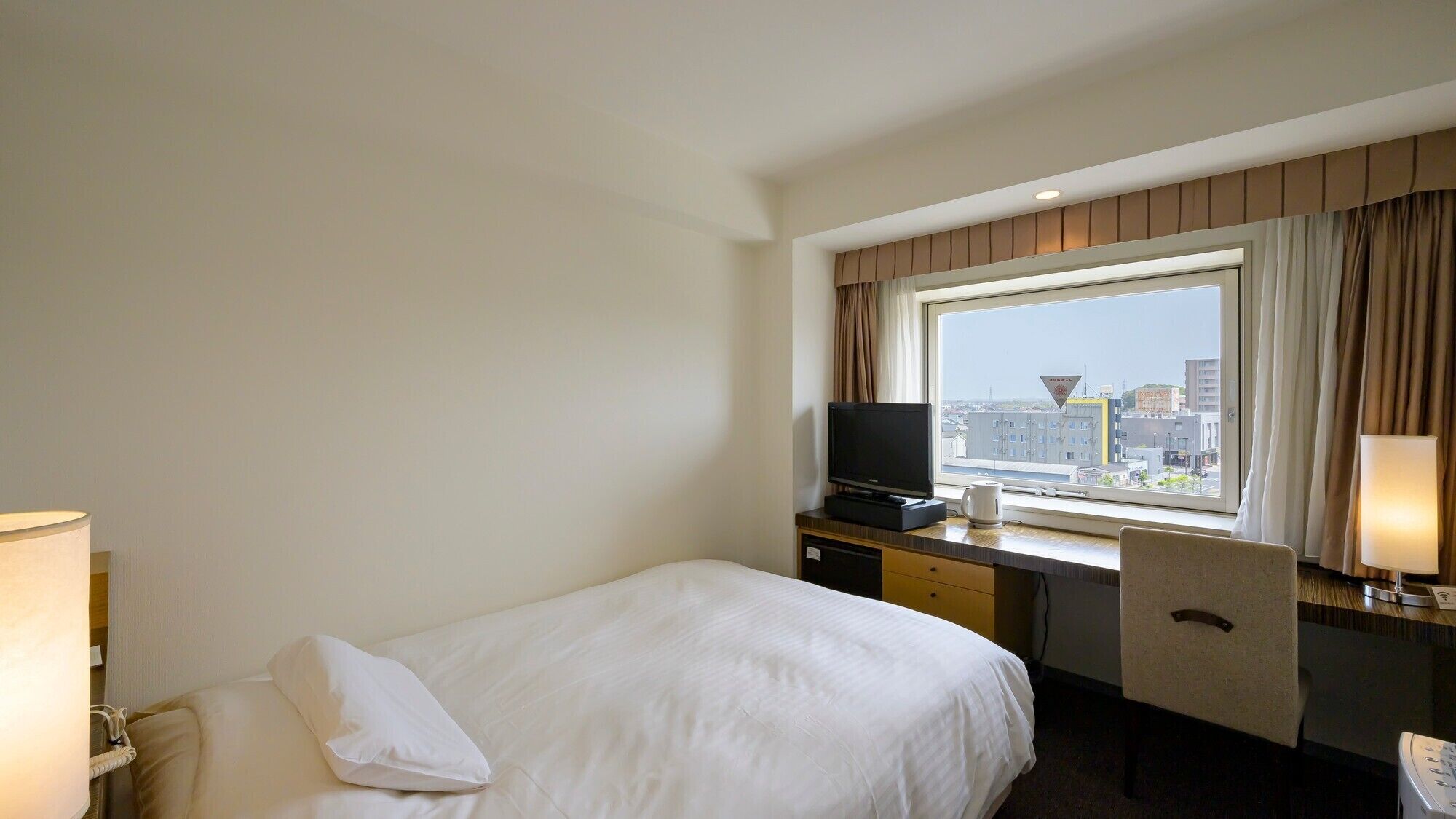 In-room safe, desk, blackout curtains, iron/ironing board (on request)