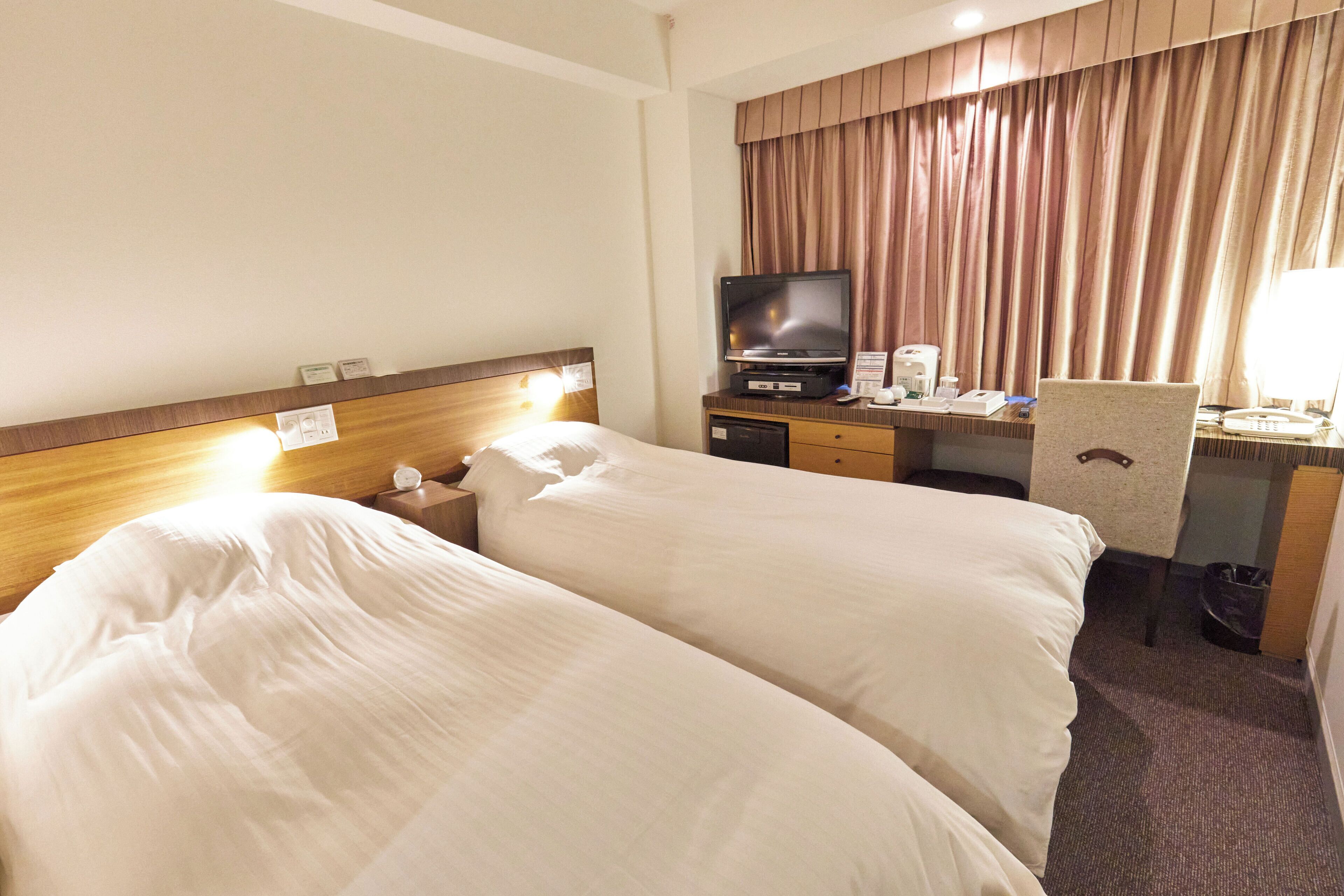 In-room safe, desk, blackout curtains, iron/ironing board (on request)