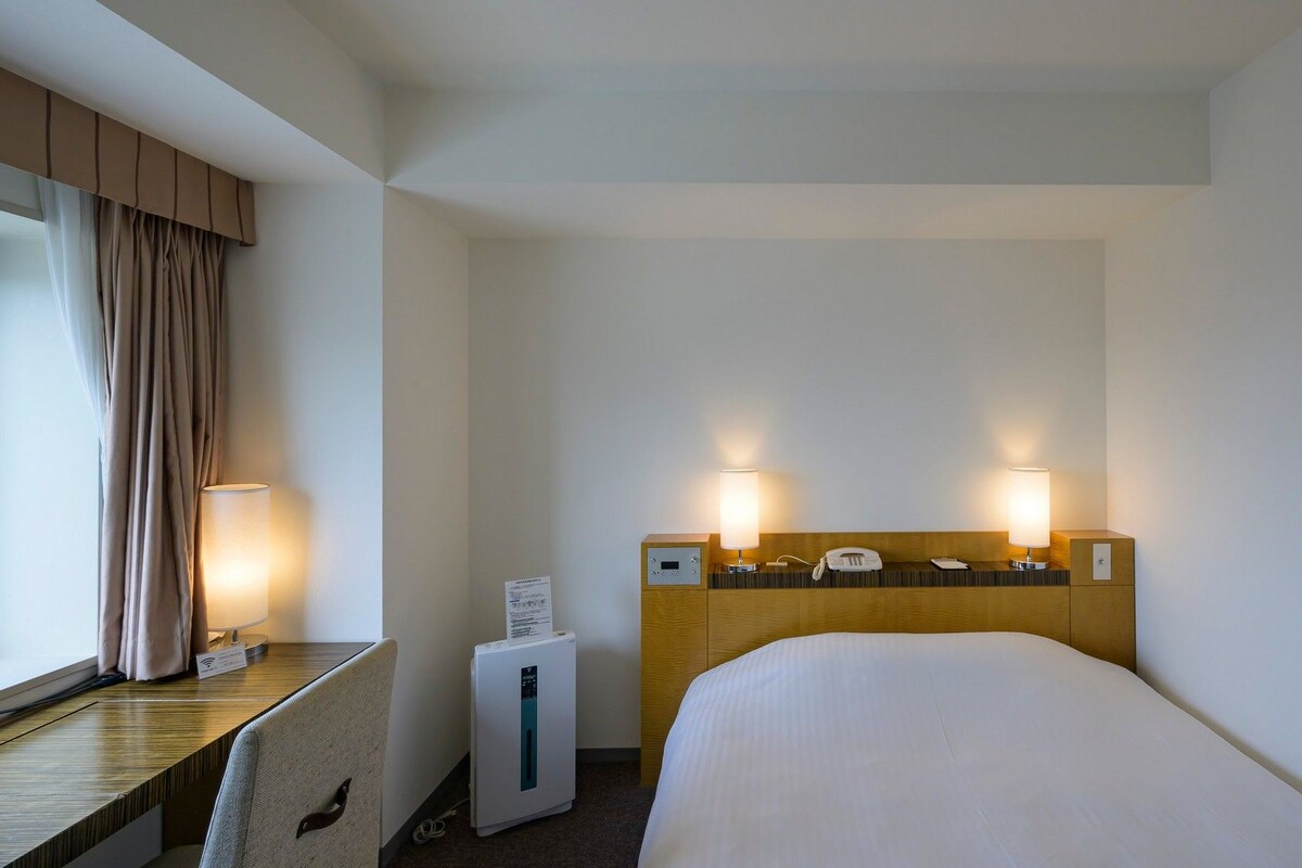 In-room safe, desk, blackout curtains, iron/ironing board (on request)
