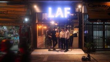 A storefront with a prominent 'LAF' sign, indicating a business or establishment.