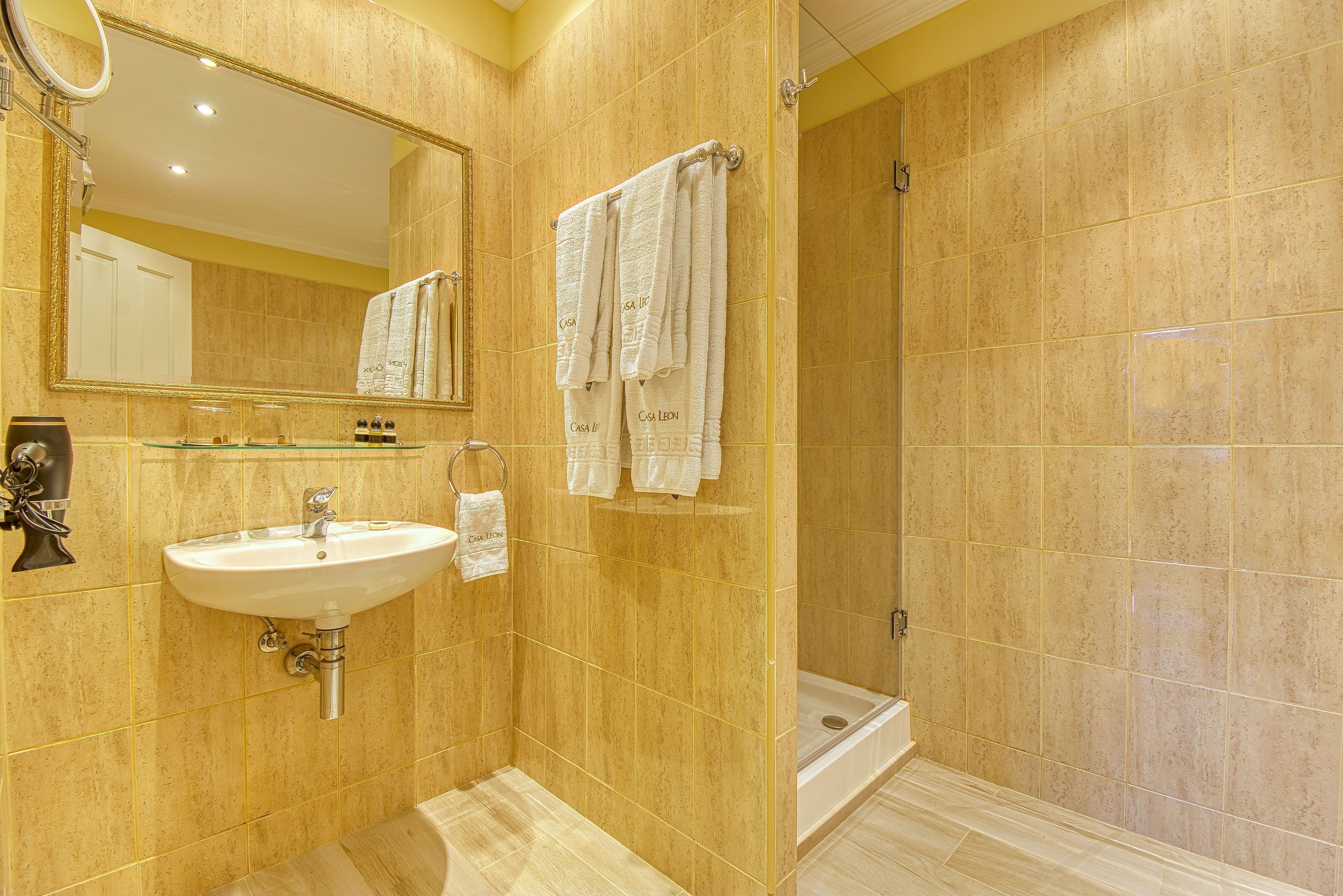 shower, free toiletries, hair dryer, bathrobes