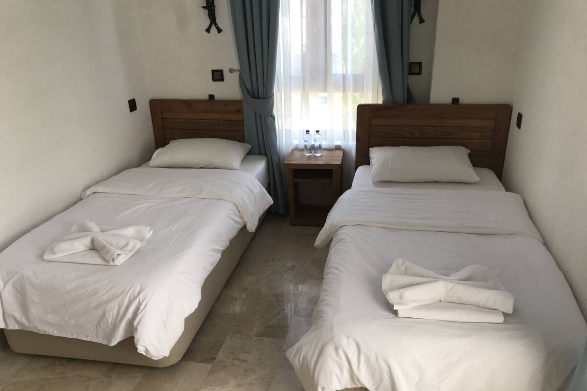 Double or Twin Room | Living area | LCD TV