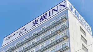 A multi-story building with a prominent sign reading "Toyoko Inn". - Toyoko Inn Osaka Hommachi No.2 (Osaka)