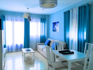 Junior Suite, Terrace, Sea View (Mykonos) | Living room | Flat-screen TV - Evita Beach Apartamentos Y Suites (Teguise)