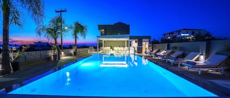 Outdoor pool, pool umbrellas, pool loungers