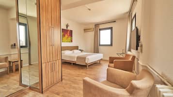 Doppelzimmer, Eckzimmer | Bettwäsche aus ägyptischer Baumwolle, hochwertige Bettwaren, Minibar
