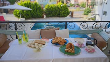 Seasonal outdoor pool, pool umbrellas, sun loungers