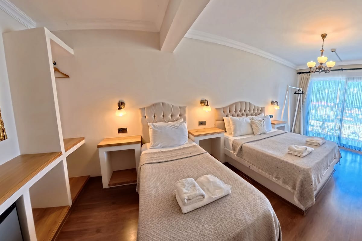 Literie de qualité supérieure, coffres-forts dans les chambres