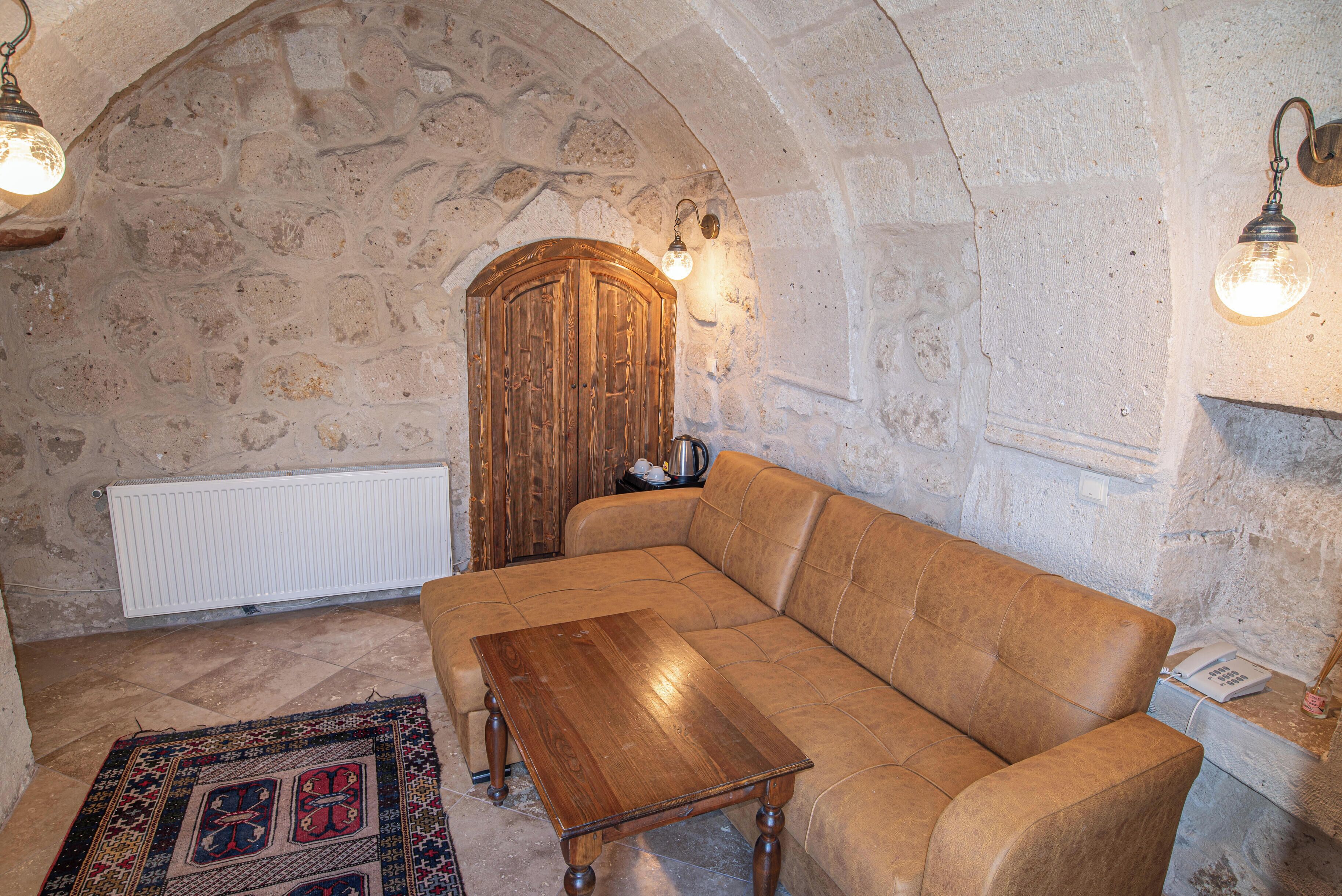 standard double room, 1 double bed | living area | lcd tv