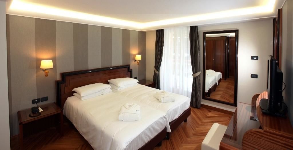 Suite | Premium bedding, minibar, in-room safe, individually decorated