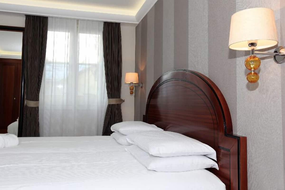 Ropa de cama de alta calidad y minibar