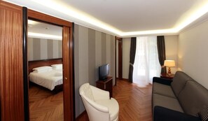 Suite | Premium bedding, minibar, in-room safe, individually decorated