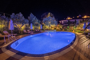 Outdoor pool, pool umbrellas, pool loungers