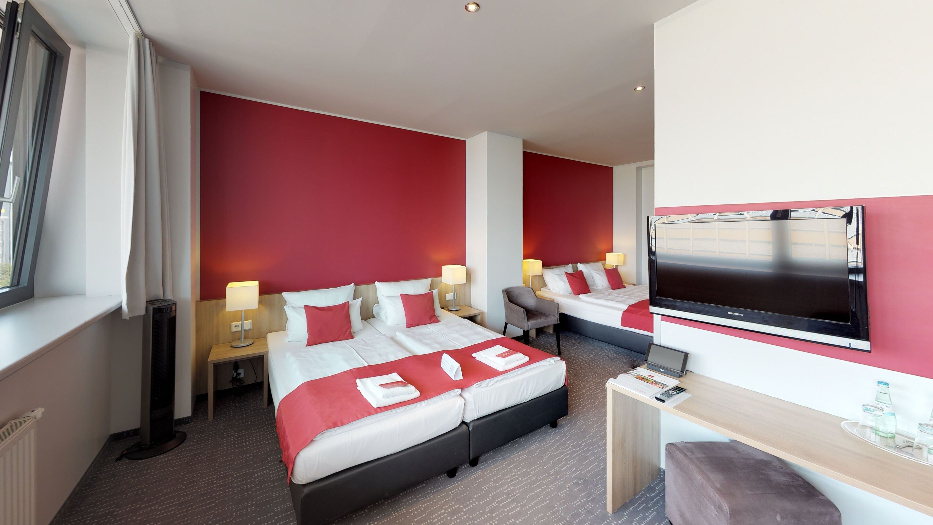 family room | premium bedding, desk, blackout curtains, soundproofing