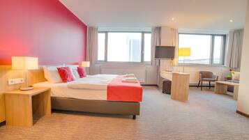 Junior Suite | 1 bedroom, premium bedding, desk, blackout curtains