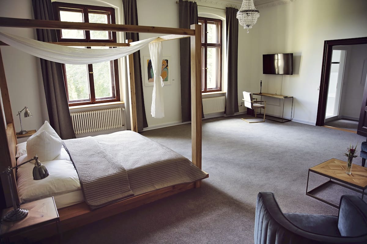 deluxe double room | in-room safe, desk, free cots/infant beds, rollaway beds