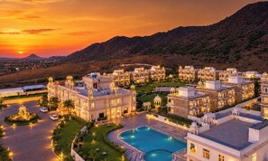 A large hotel complex with multiple buildings, a swimming pool, and a landscaped garden. - Bhanwar Singh Palace (Pushkar)