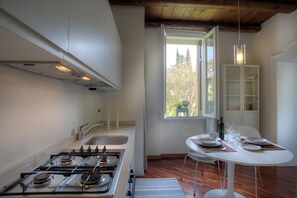 Apartment, 1 Bedroom | Private kitchen | Fridge, stovetop, cookware/dishes/utensils - Verona For Rent Olmo (Verona)