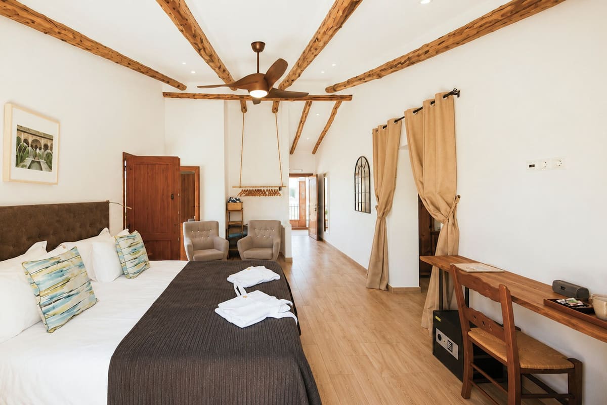 Suite Deluxe, vista al jardín | Sábanas de algodón egipcio y ropa de cama de alta calidad
