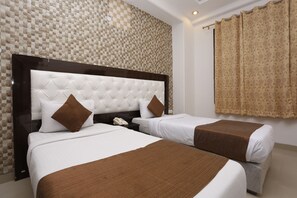 In-room safe, desk, iron/ironing board, rollaway beds - Mint City Center Suites (Noida)