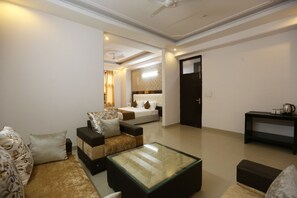 Deluxe Room, 1 Bedroom | Living area | Flat-screen TV - Mint City Center Suites (Noida)