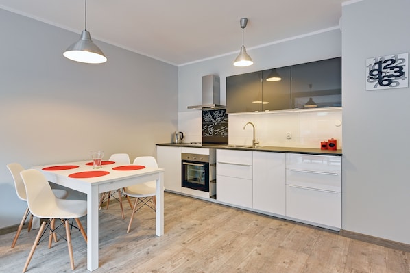 Apartment | Private kitchenette | Fridge, oven, stovetop, electric kettle