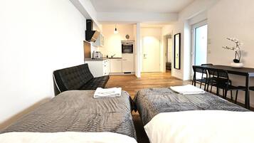Deluxe appartement | 2 slaapkamers, luxe beddengoed, een bureau, een strijkplank/strijkijzer