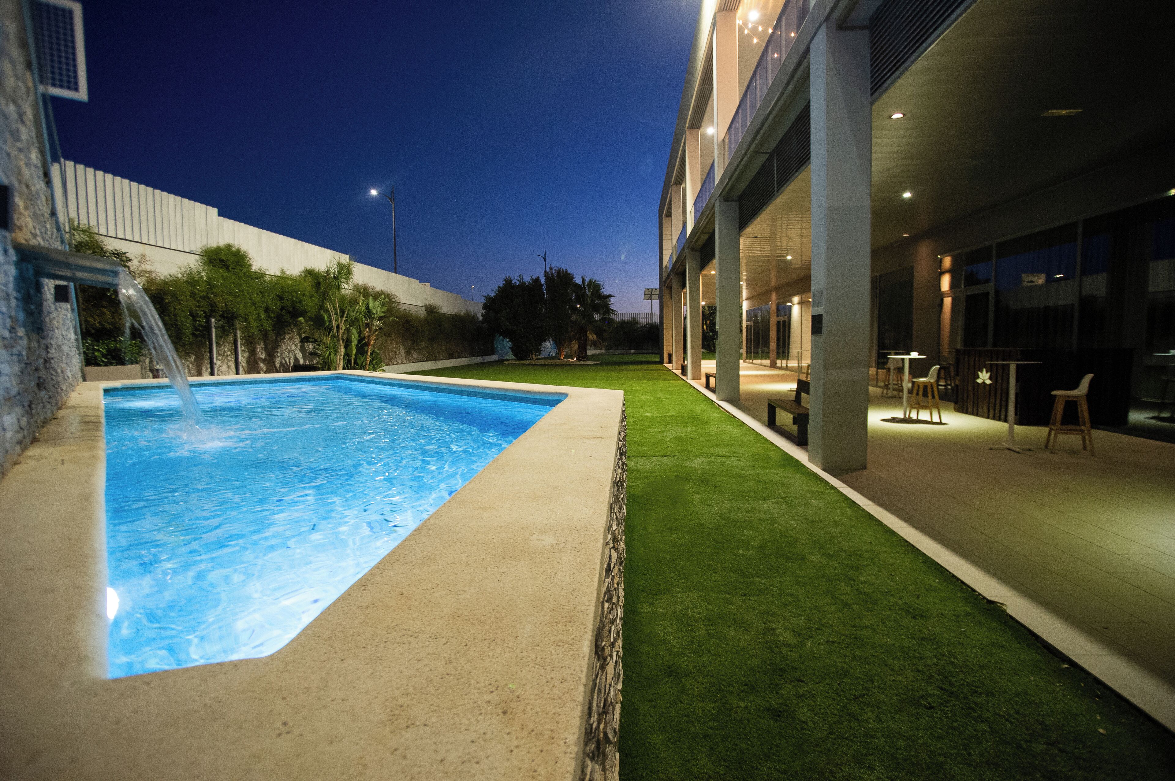 seasonal outdoor pool, pool umbrellas, pool loungers