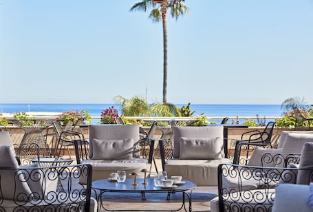 Terrace/patio. Atlantica Bay Hotel - Adults Only