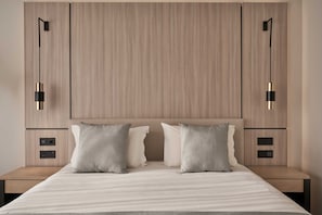 A modern bedroom with a wooden headboard, two bedside tables, and a bed with pillows. - Atlantica Bay Hotel - Adults Only (Limassol)