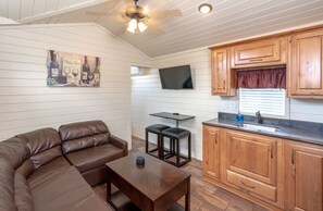 Cottage, 2 Bedrooms | Living area | 15-inch TV with cable channels - 49'er Village RV Resort (Plymouth)